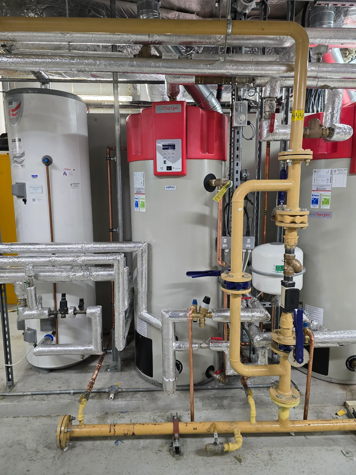 EcoCharger commercial hot water boiler with insulated pipework and gas supply